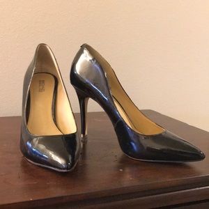 Black Michael Kors patent pumps